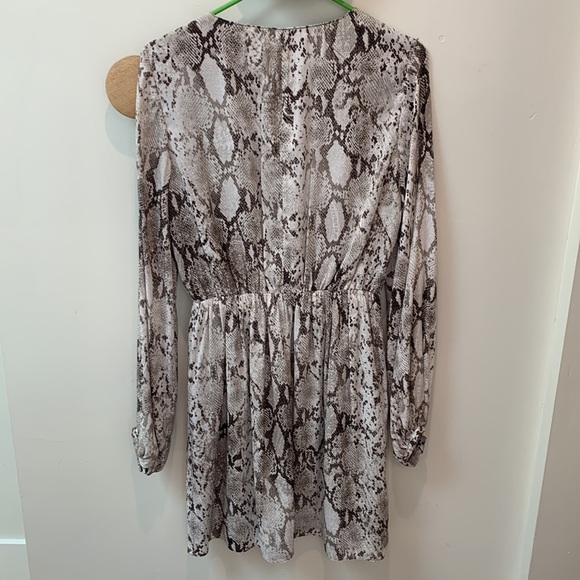 Jennifer Lopez Snakeskin Look, Faux Wrap Dress V-neck crisscross design. - Picture 8 of 17